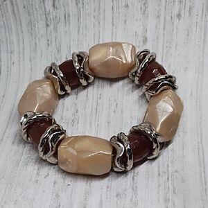 Elegant Brown and Cream Swirl Beaded Stretch Bracelet W Silver Tone Accents